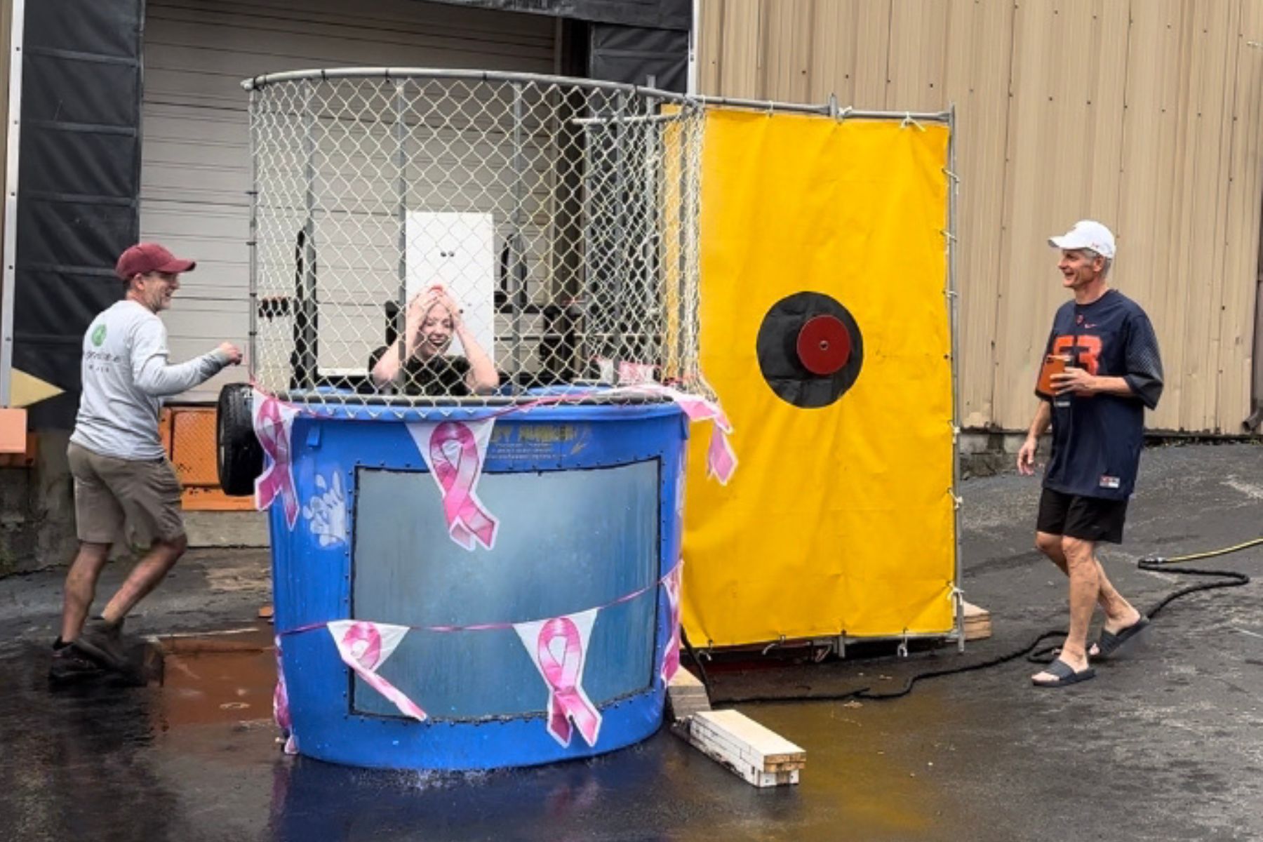 Woman coming out of dunk tank