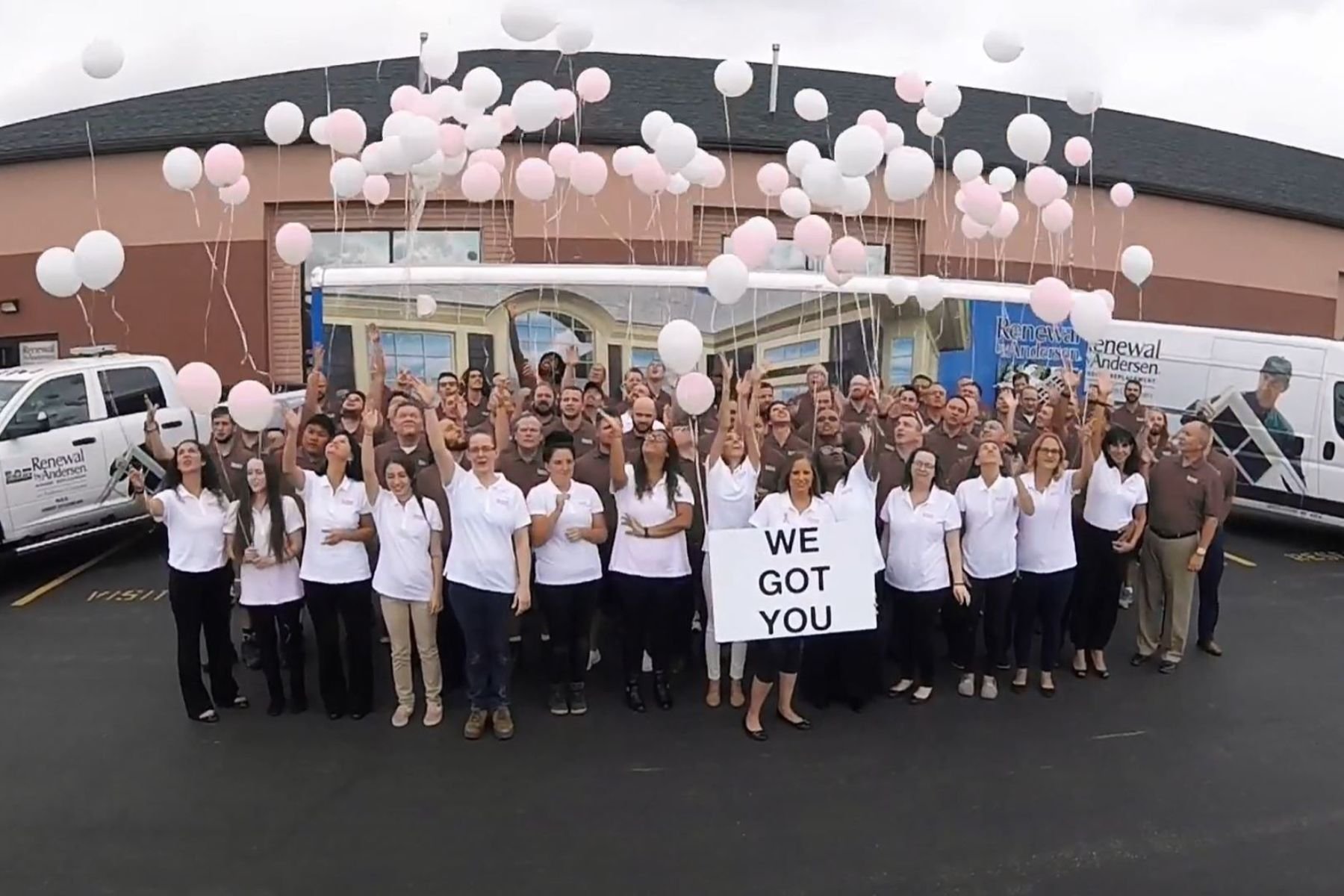 Group of RbA employees releasing balloons for American Cancer Society Event.