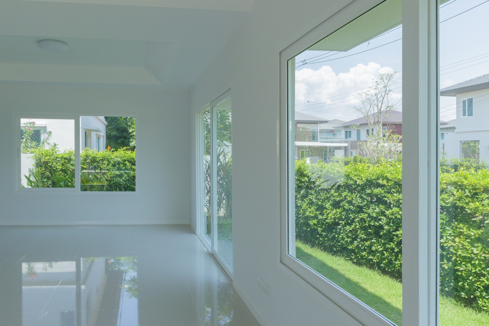 A window made out of fiberglass. Fiberglass outlasts wood, typically doesn’t rot, gets chalky, and may fade over time.