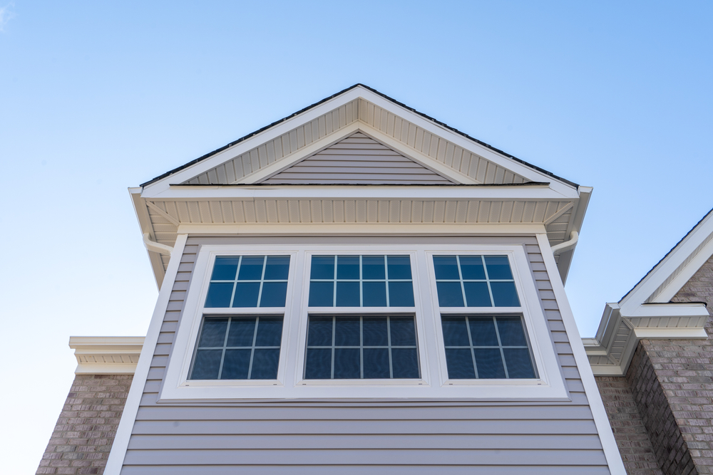 A window made with vinyl. Vinyl may bend, bow, or crack. it is often the most economic alternative. It is ow-maintenance, but can have a shorter lifespan.