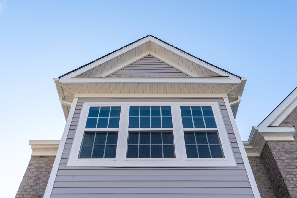 A window made with vinyl. Vinyl may bend, bow, or crack. it is often the most economic alternative. It is ow-maintenance, but can have a shorter lifespan.